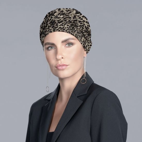 Model wearing a leopard print turban cap